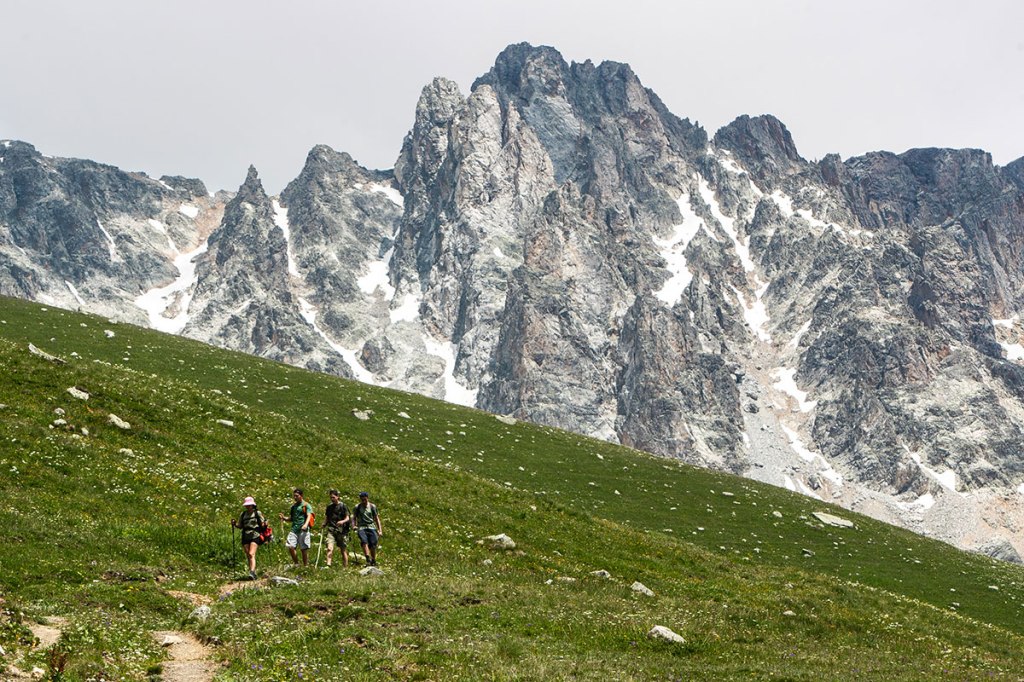 Beautiful view of alpine field and glacier. Highlander Adventure, Biliki App