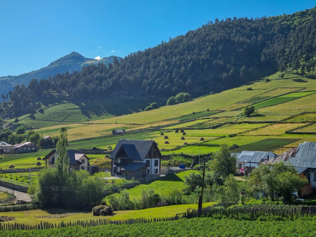 Beautiful view on the village and field. Highlander Adventure, Biliki App